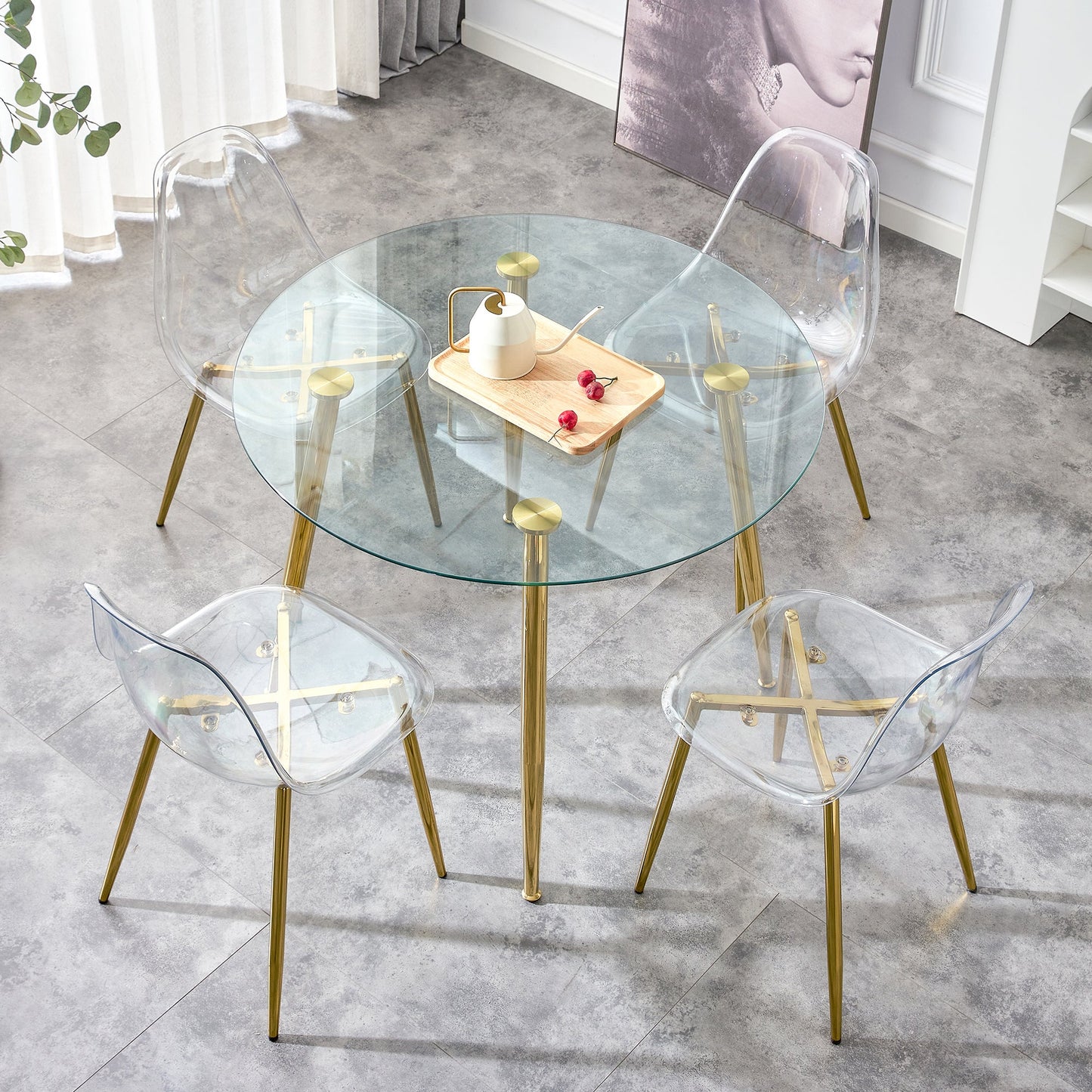 A Glass Tabletop With a Diameter of 40 Inches and a Modern Minimalist Circular Dining Table With Gold Plated Metal Legs.