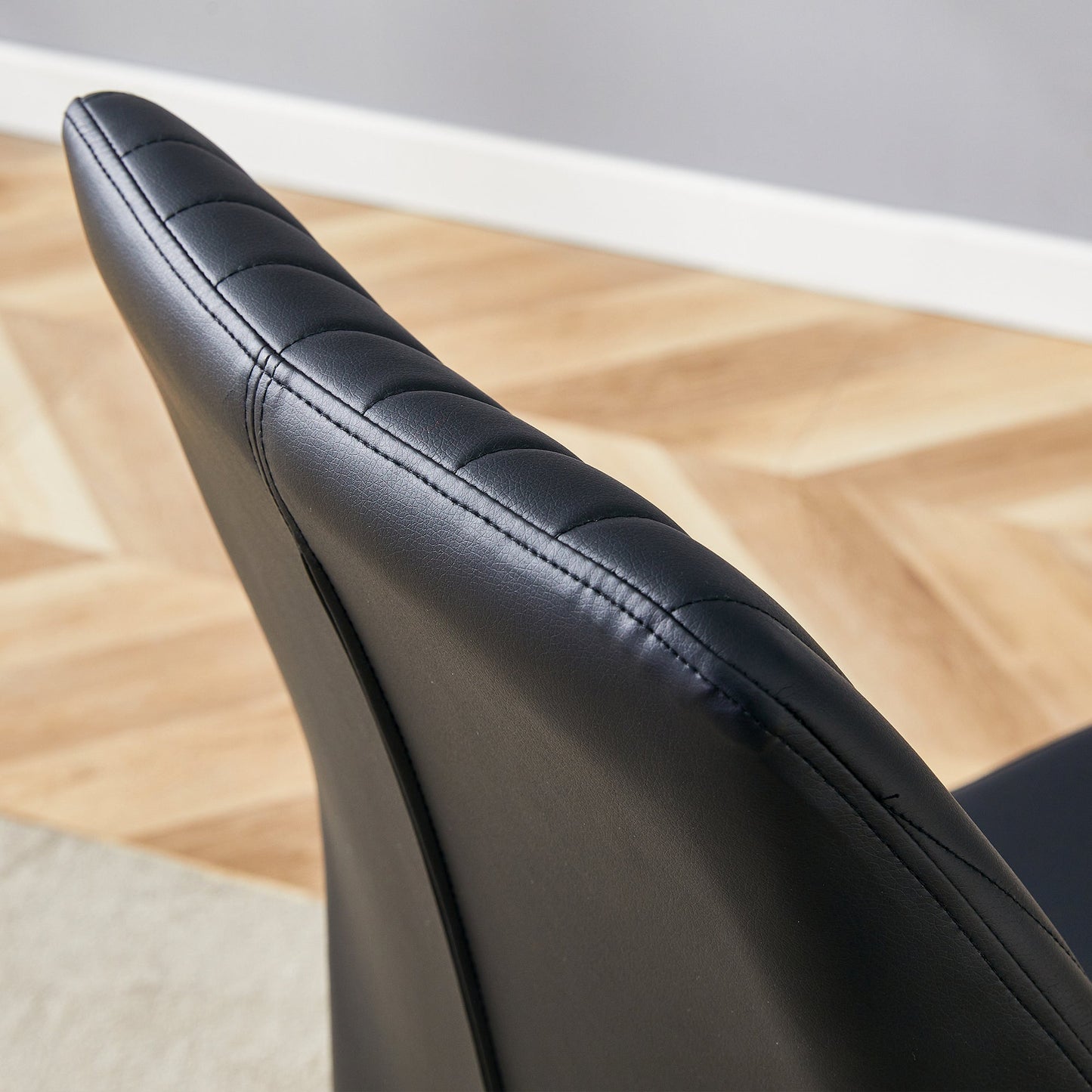 Table and Chair set.A 38.6' Transparent Tempered Glass Round Dining Table-Silver Metal Legs.Paired With 6 BLACK PU Mater