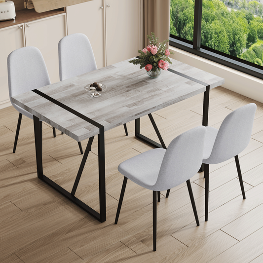 Table and Chair set.A Minimalist Retro Rectangular Dining Table With a Specially Textured Top and Black Metal legs.Paire