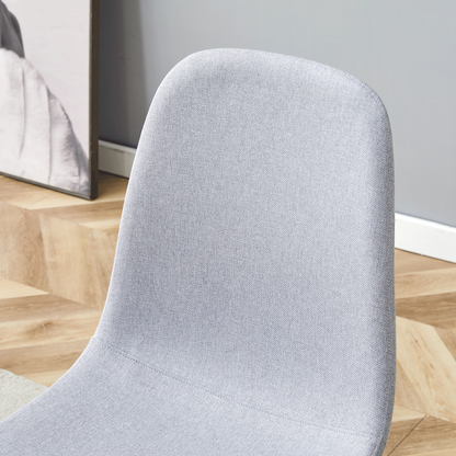 Table and Chair set.A Minimalist Retro Rectangular Dining Table With a Specially Textured Top and Black Metal legs.Paire