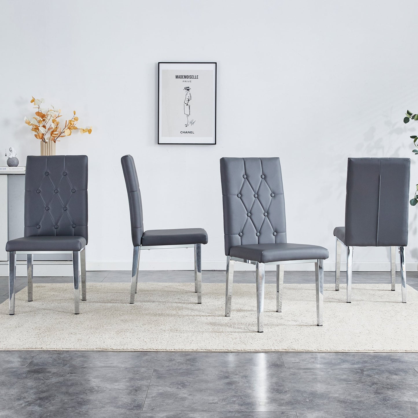 4 Piece Set of Gray Armless Dining Chairs Brings a Touch of Elegance and Mystery to the Dining Area With Its Deep Gray T