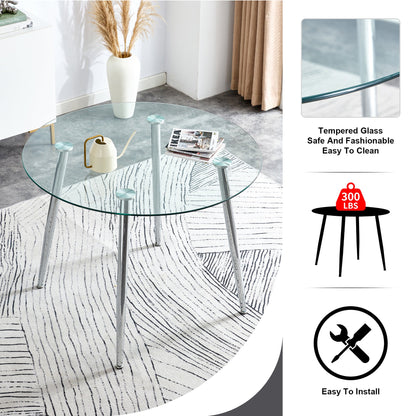 Table and Chair set.A 38.6' Diameter Transparent Tempered Glass Round Dining Table-Silver Metal Legs.Paried With 4 Black