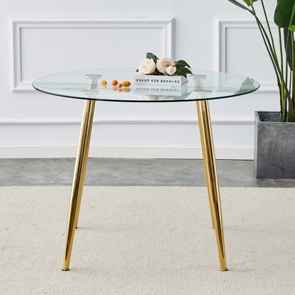 A Glass Tabletop With a Diameter of 40 Inches and a Modern Minimalist Circular Dining Table With Gold Plated Metal Legs.