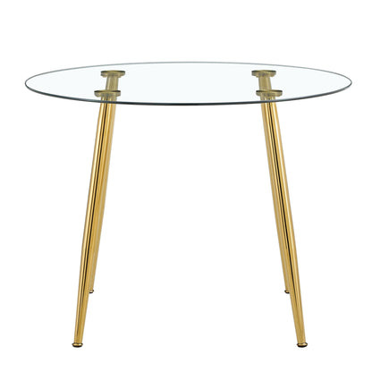 A Glass Tabletop With a Diameter of 40 Inches and a Modern Minimalist Circular Dining Table With Gold Plated Metal Legs.