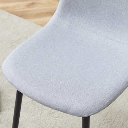 Table and Chair set.A Minimalist Retro Rectangular Dining Table With a Specially Textured Top and Black Metal legs.Paire