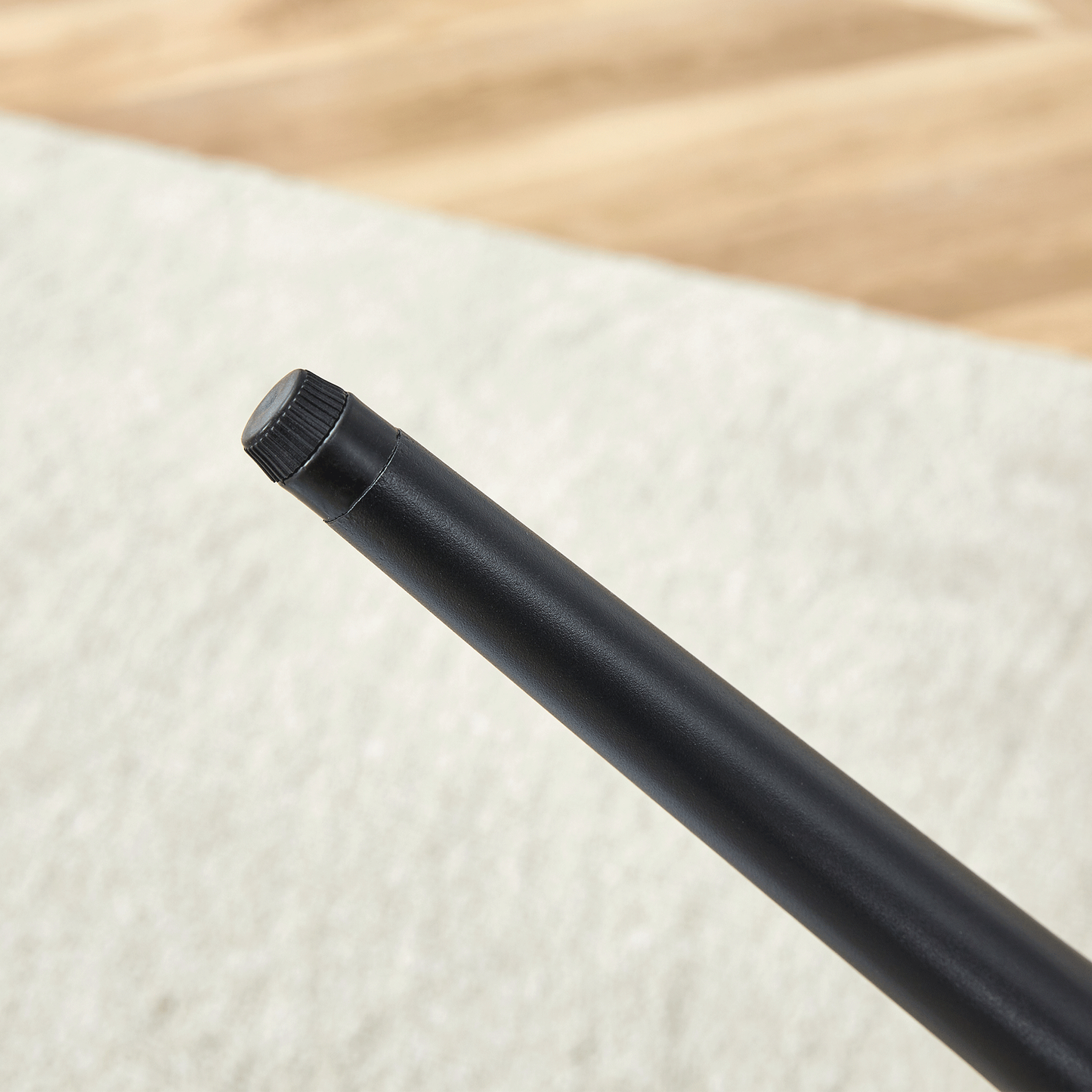 Table and Chair set.A Minimalist Retro Rectangular Dining Table With a Specially Textured Top and Black Metal legs.Paire