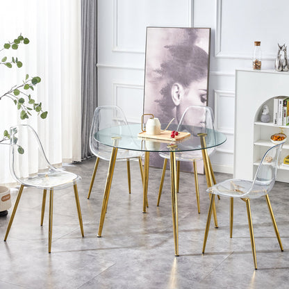 A Glass Tabletop With a Diameter of 40 Inches and a Modern Minimalist Circular Dining Table With Gold Plated Metal Legs.