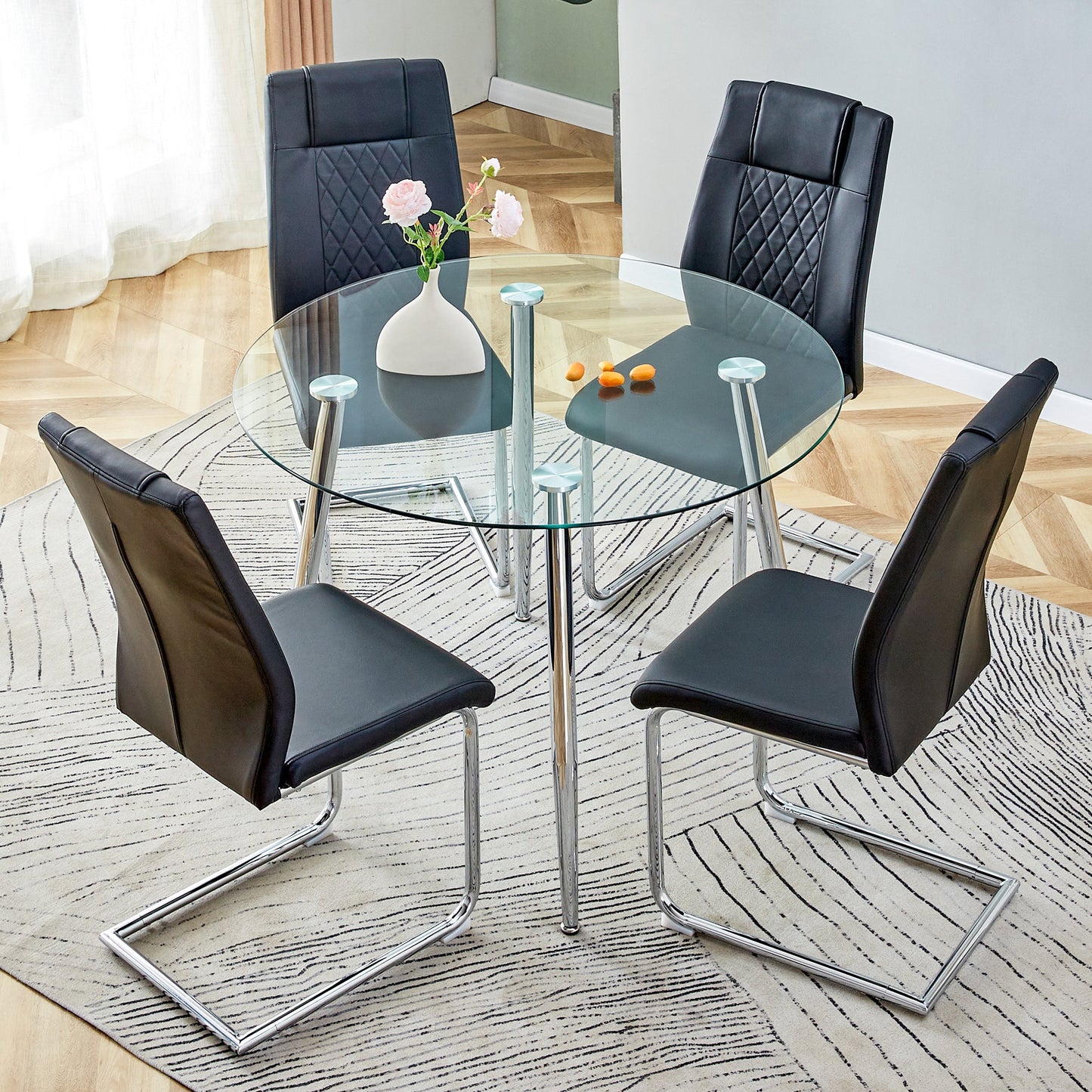 Table and Chair set.A 38.6' Diameter Transparent Tempered Glass Round Dining Table-Silver Metal Legs.Paried With 4 Black