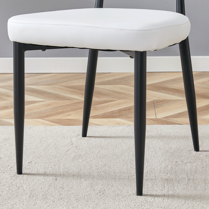 Minimalist Ergonomic Dining Chair With Curved Backrest in Black and White, Metal Legs, PU Leather, Set of 4